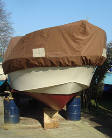 A boat being stored on the hard for winter.