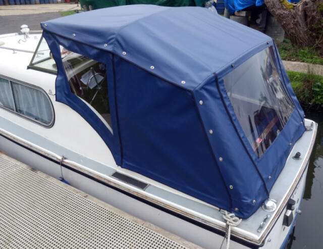 A blue vinyl Freeman Cruiser canopy newly fitted to the Freeman Cruiser 22 Mk2