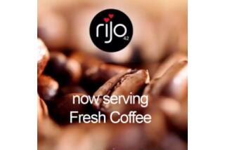 A pile of coffee beans with the Rijo42 Coffee and words 'now serving Fresh Coffee'.