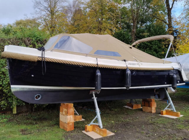 A boat stored on chokes for winter storage.