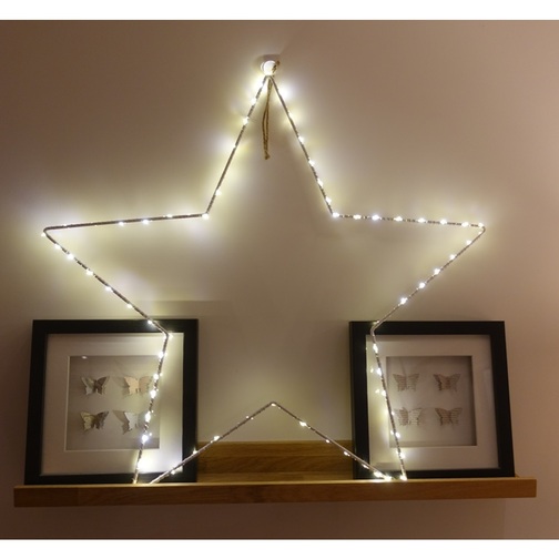 LED Christmas Wire Stars Resting on a Shelf